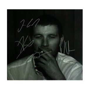 Arctic Monkeys Disco Vinyl "Whatever People Say I Am That's What I'm Not" firmado por Arctic Monkeys
